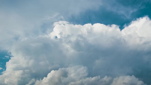 Timelapse of White Puffy Cumulus Clouds Forming on Summer Blue Sky