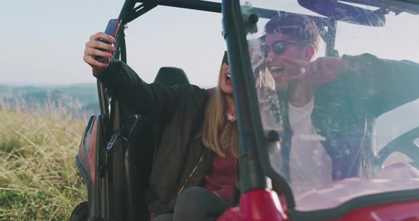 Young Friends Having Fun in Morning Sun Hipsters Looking for Adventure Taking Selfie Photo