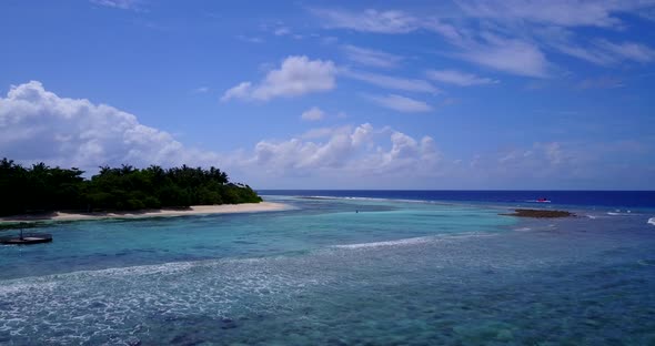 Daytime flying island view of a white paradise beach and turquoise sea background in colourful 