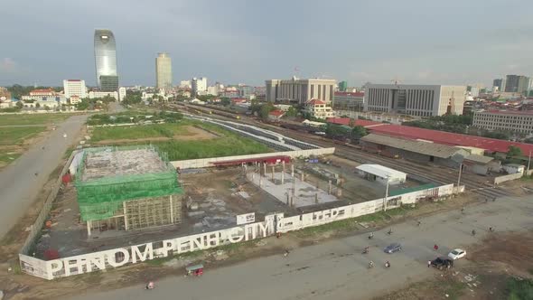 Aerial view of Phnom Penh City sign letter next to construction site, Cambodia.