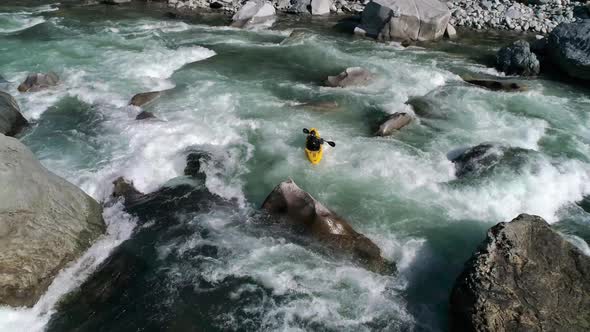 Whitewater Kayak Aerial Charging Rocky Rapids