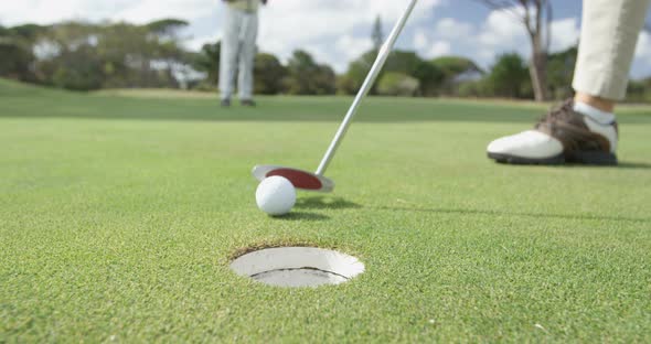 Golfer playing golf