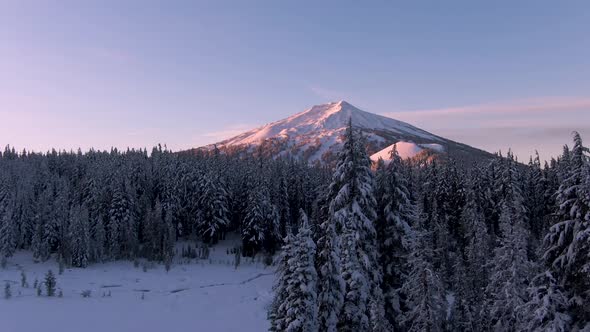 Snowy Mountain At Sunrise