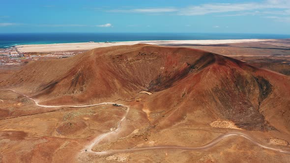 Drone Flight Over Deserted Landscape Near to Town Corralejo