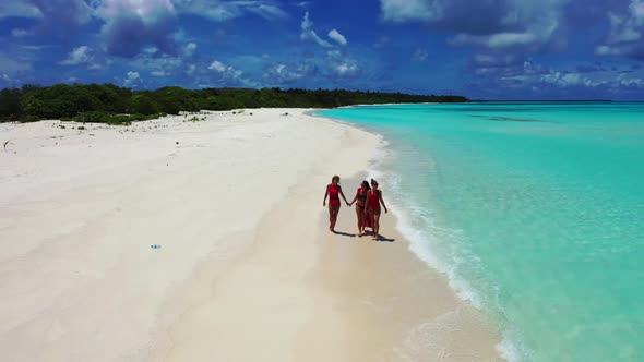 Women enjoying life on exotic sea view beach journey by blue sea and white sand background of the Ma