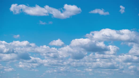 Timelapse of Cumulus Clouds Moving in the Blue Sky