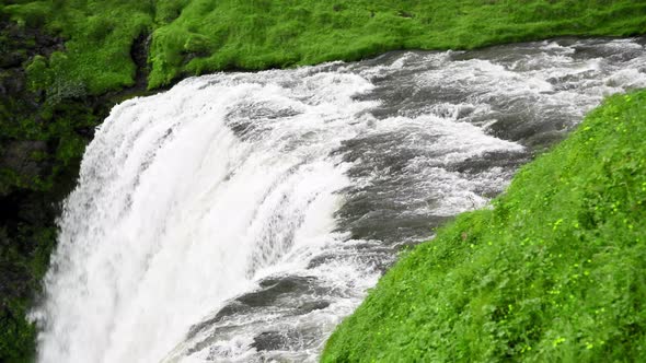 Skogafoss Waterfalls and Mountains in Summer Season Iceland