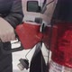 A Woman Fills Up Her Car - VideoHive Item for Sale