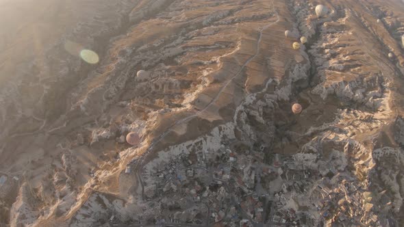 Cappadocia Aerial Shot of Rock Chimneys and Uchisar Castle in Goreme Turkey