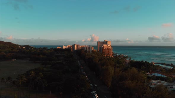 Aerial drone footage of Honolulu, Hawaii. Beautiful real estate, buildings in the city. Palm trees