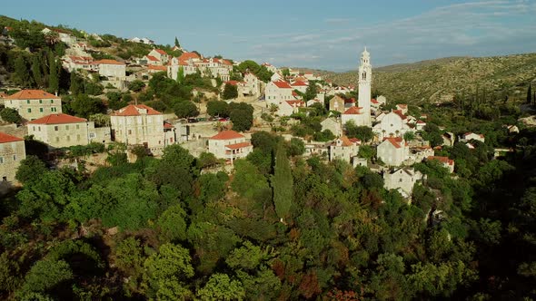 Aerial view of traditional dalmatian village of Lozisca, Brac Island, Croatia.