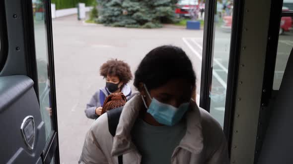 Masked Secondary School Pupils Boarding School Bus