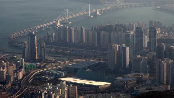 Timelapse Busan with Large Road and Bridge Over Blue Water