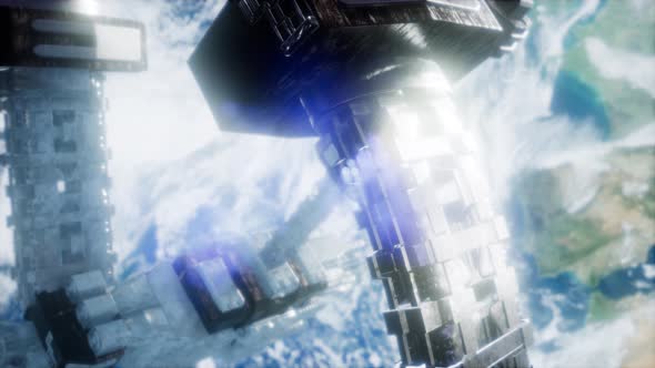 Space Station And Earth. 3D Animation alt