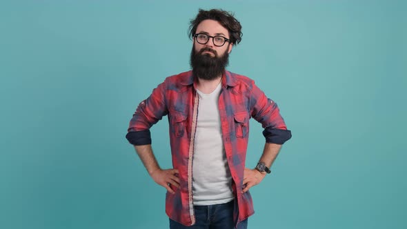 Portrait of a Bearded Man Making the Time Out Gesture Asking for a Break