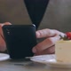 Customer in Cafe Using Smartphone During Coffee Break - VideoHive Item for Sale