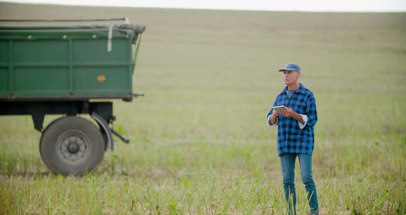 Farmer Using Digital Tablet Agriculture