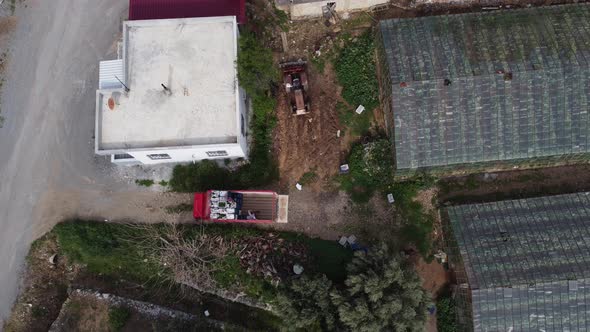 Aerial Drone Farmer Truck Approaching Greenhouse