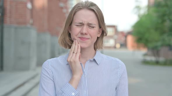 Portrait of Woman Having Toothache Cavity