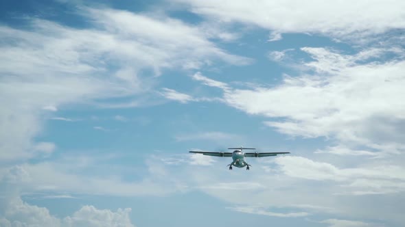 Airplane Landing Above The Sea Water