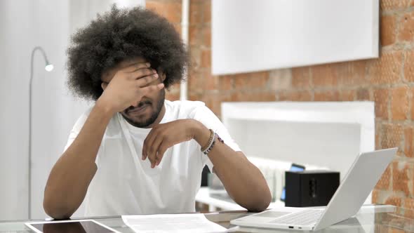 Headache Stressed African Man in Loft Office