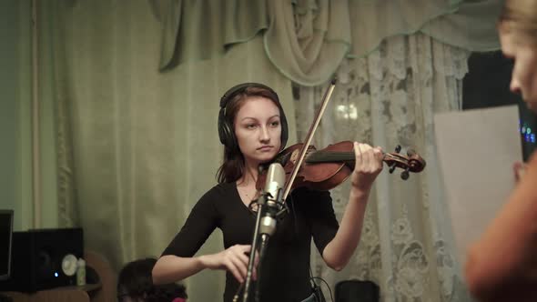 Process of Rehearsing the Instrumental Melody with Violin By Female Musicians