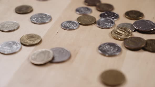 panoramic shooting of coins lying on the table