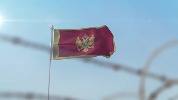 Montenegro Flag Behind Border alt