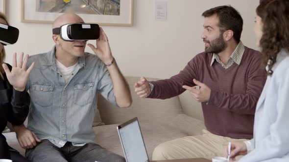 Agitated Mature People Experiencing VR Glasses