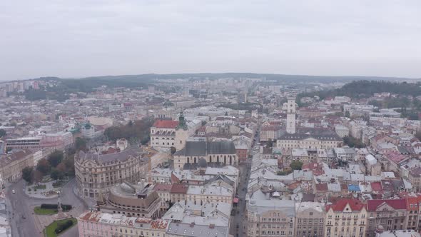 Aerial Drone Video of European City Lviv Ukraine Rynok Square Central Town Hall Dominican Church