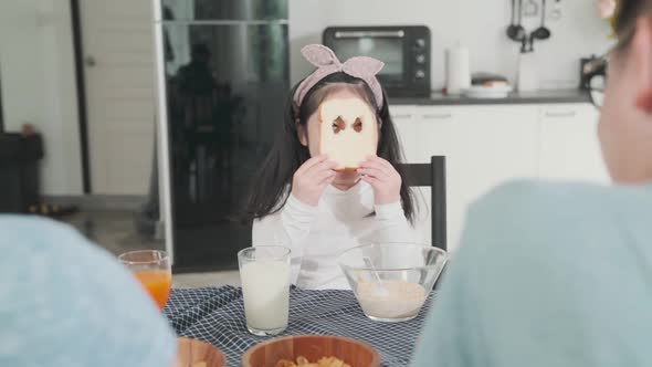 Happiness Asian Japanese family  breakfast at home. young parent and daughter