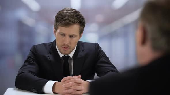 Company HR Manager Watching Through Young Man Resume, Job Interview Failure