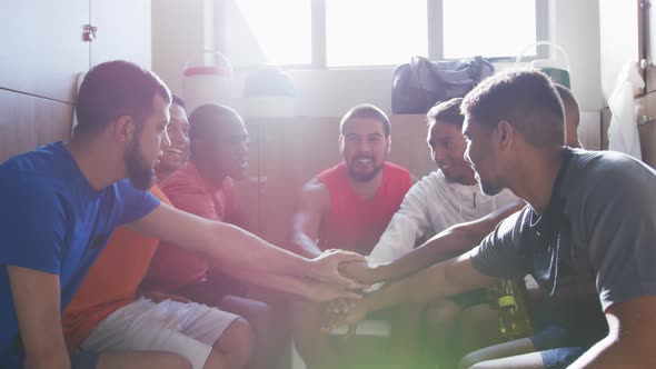 Group of soccer players in the locker room