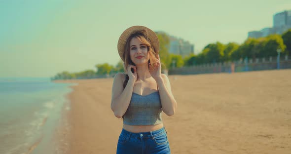 Happy Girl Walking on the Beach