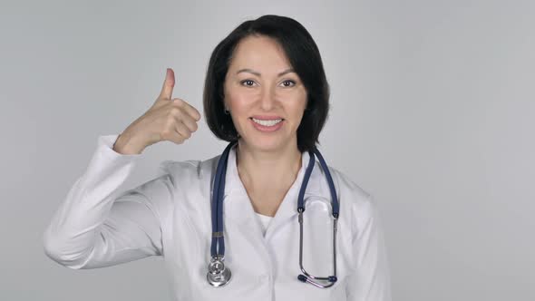 Portrait of Lady Doctor Gesturing Thumbs Up