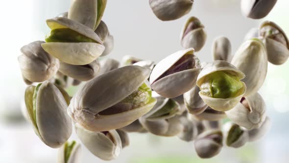 Flying of Pistachios in Kitchen Background