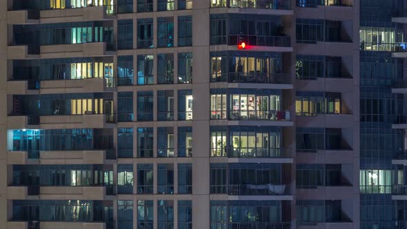 Glowing Windows of Skyscrapers at Evening Timelapse