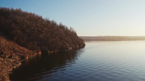 Flying over the water. 