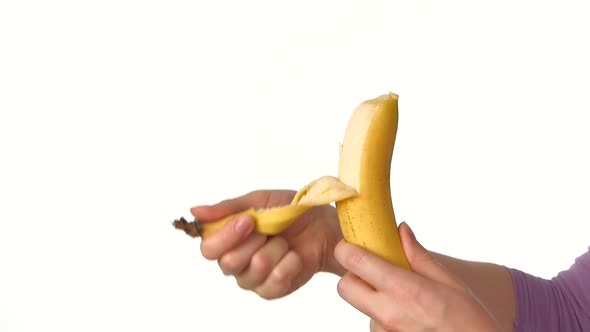 Peeling Banana on White, Slow Motion