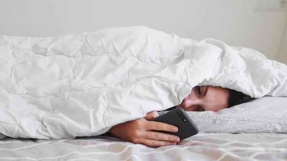 Young Woman Goes to Sleep Phone Addiction Insomnia