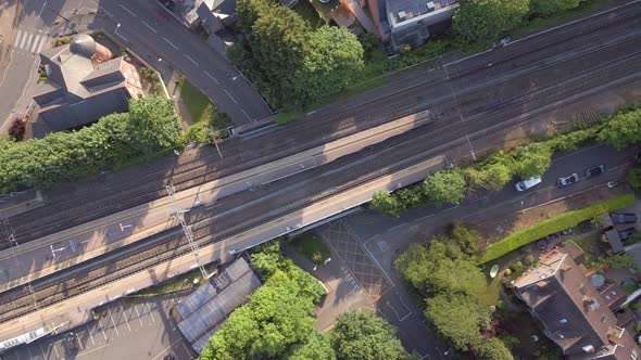 Commuter Trains at a Station in the UK Aerial Time Lapse