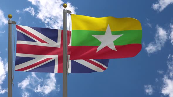 United Kingdom Flag Vs Myanmar Flag On Flagpole