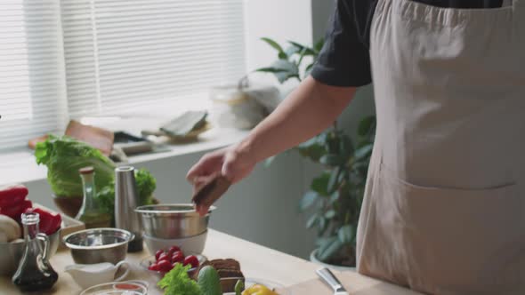 Male Chef Telling about Ingredients at Camera