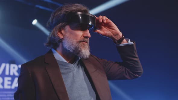 Creator in Virtual Reality Glasses at a Conference