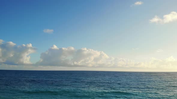 Runner Run Along the Coast of Ocean at Sunrise