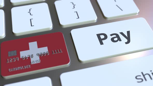 Bank Card with Flag of Switzerland As a Key on a Keyboard alt