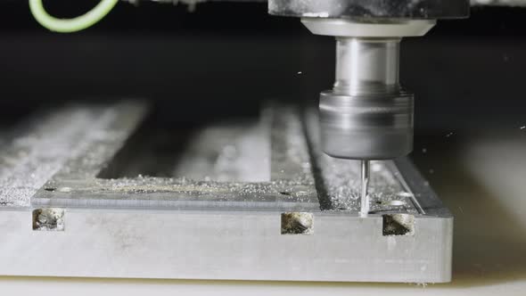 Automatic Cnc Turning Milling Machine Cutting Metal Workpiece with Shavings at Factory