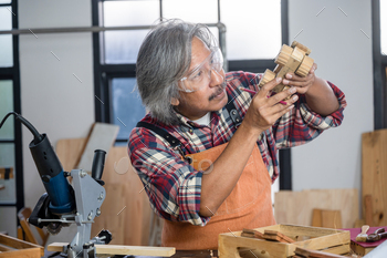 professional carpenter man working with woodwork industry tool construction / Photodune, Misc