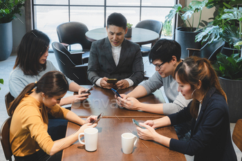 professional business person holding smartphone and using to work / Photodune, Misc
