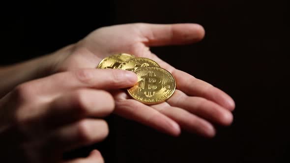 Woman Hand Holding Cryptocurrency Golden Bitcoin Coin Ondark Background